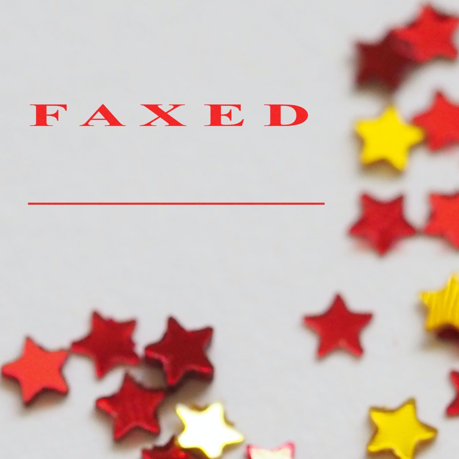 FAXED confirmation text with colorful red and yellow stars on white background, indicating documents were sent by fax