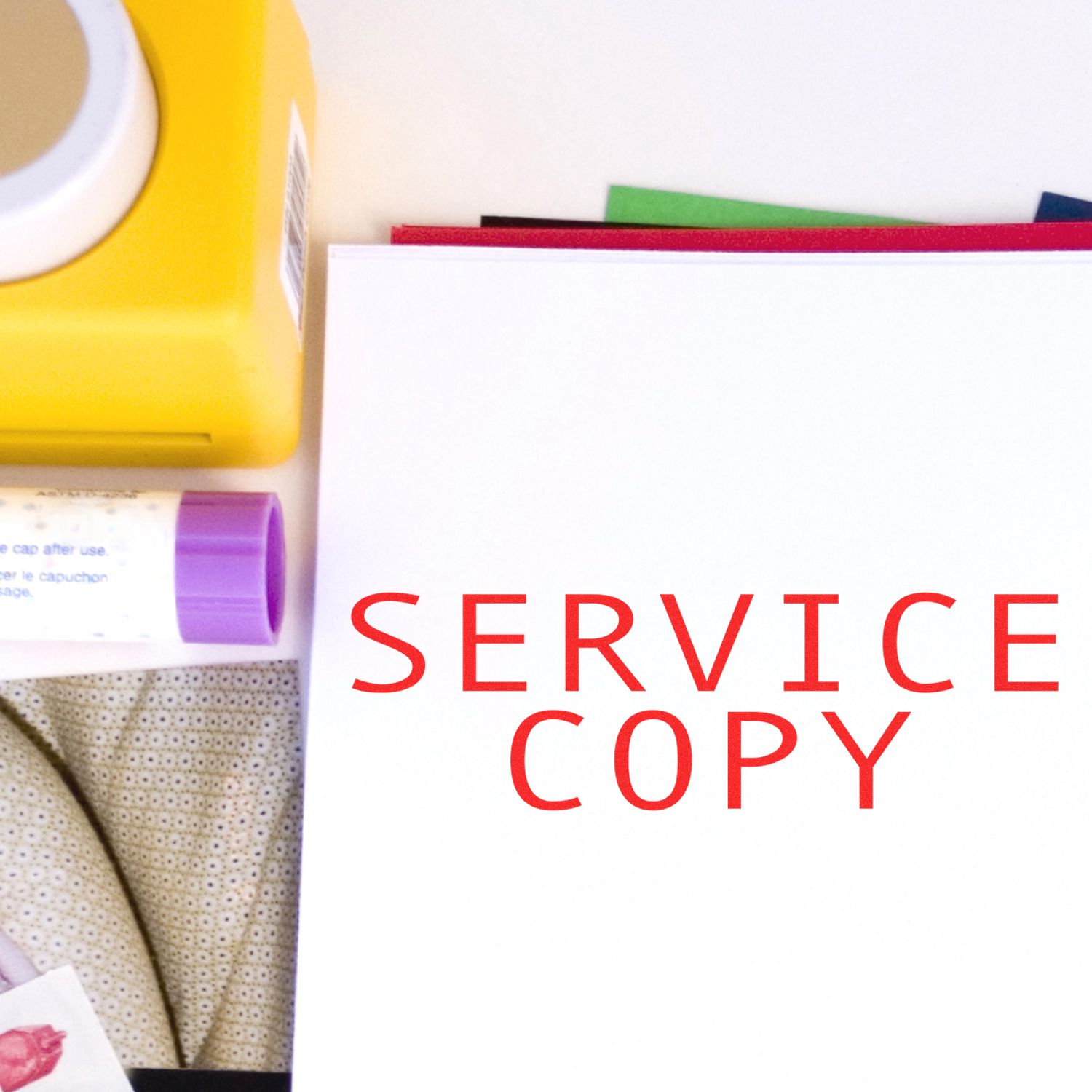 Copy service promotional image with office supplies and colorful stationery, featuring the words Service Copy in red print branding.
