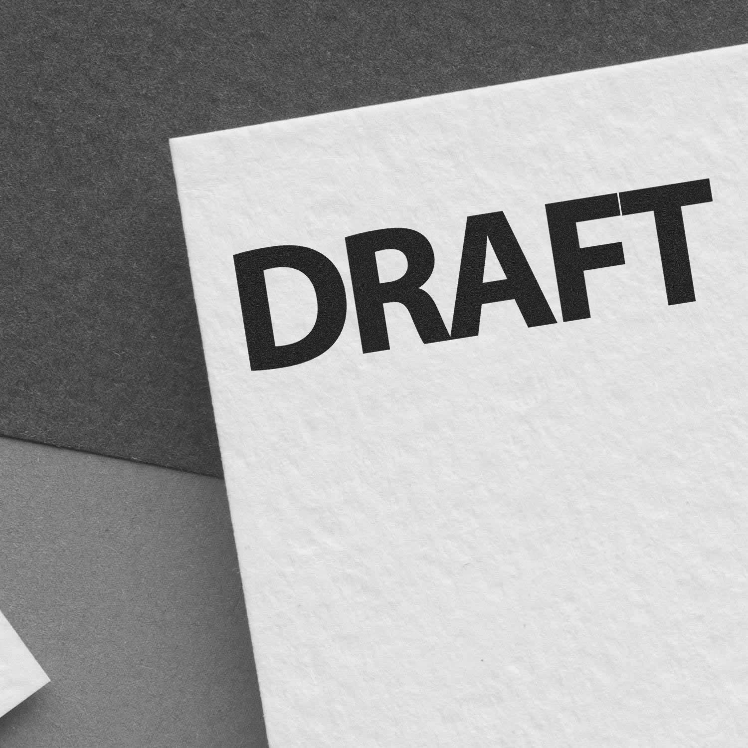 DRAFT document cover showing DRAFT text on paper, indicating an in-progress manuscript or proposal for review.