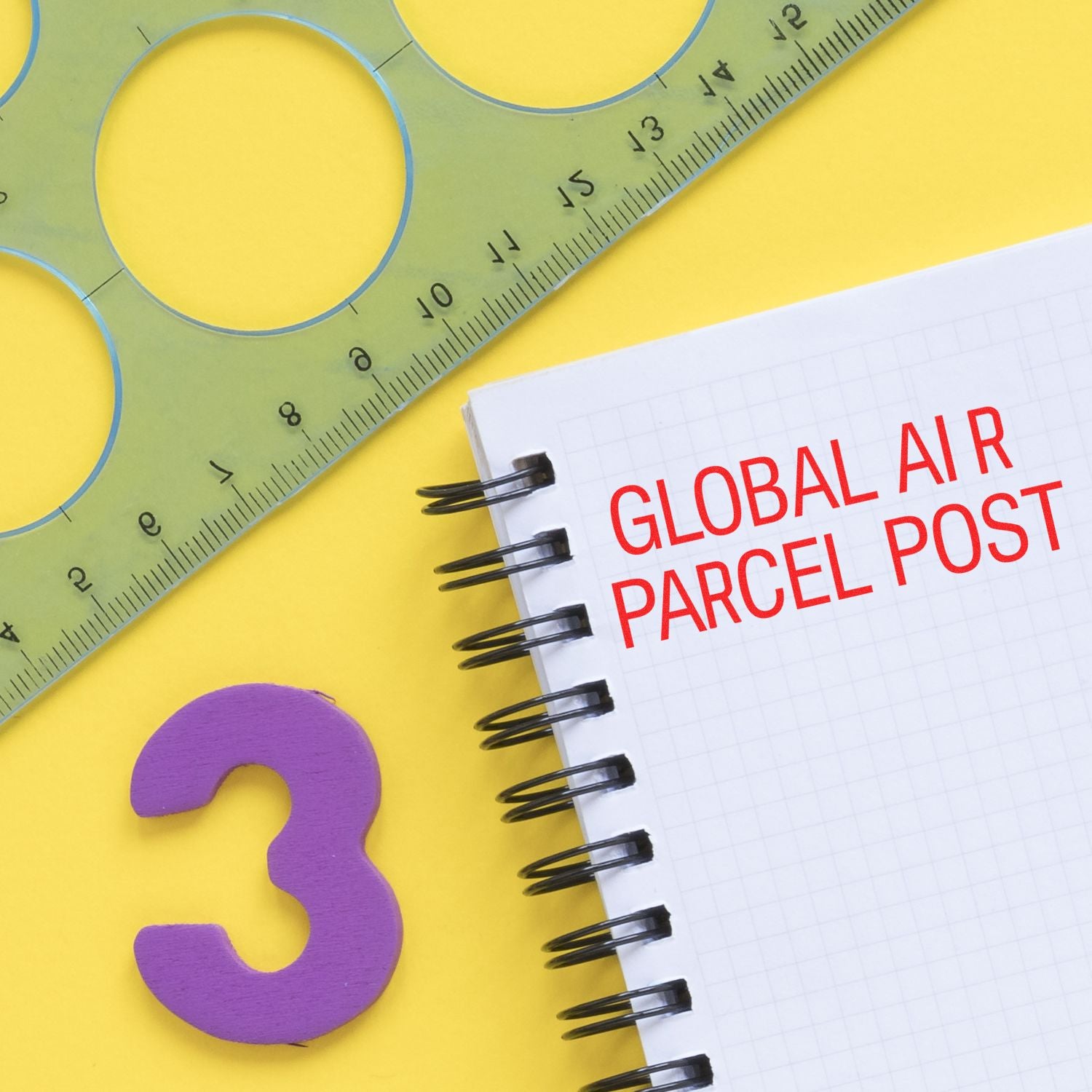 Global Air Parcel Post on notebook beside ruler and number 3, promoting worldwide international air shipping and parcel delivery.