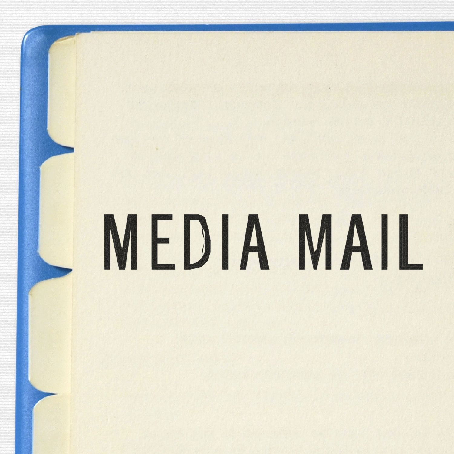 USPS Media Mail shipping label on a package with MEDIA MAIL text, indicating discounted media postage rates