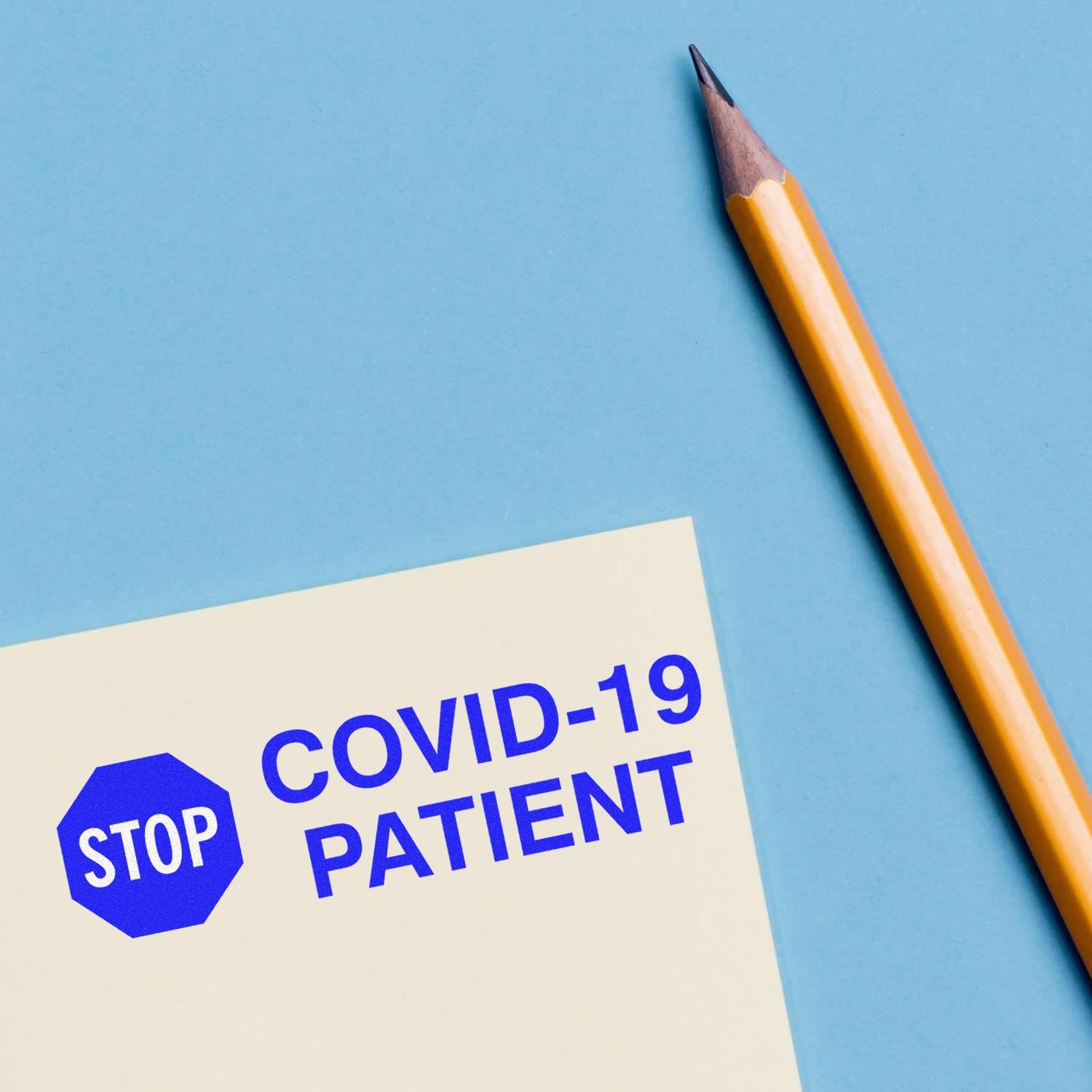 Stop COVID-19 patient notice card with pencil, highlighting COVID-19 prevention and infection control messaging.