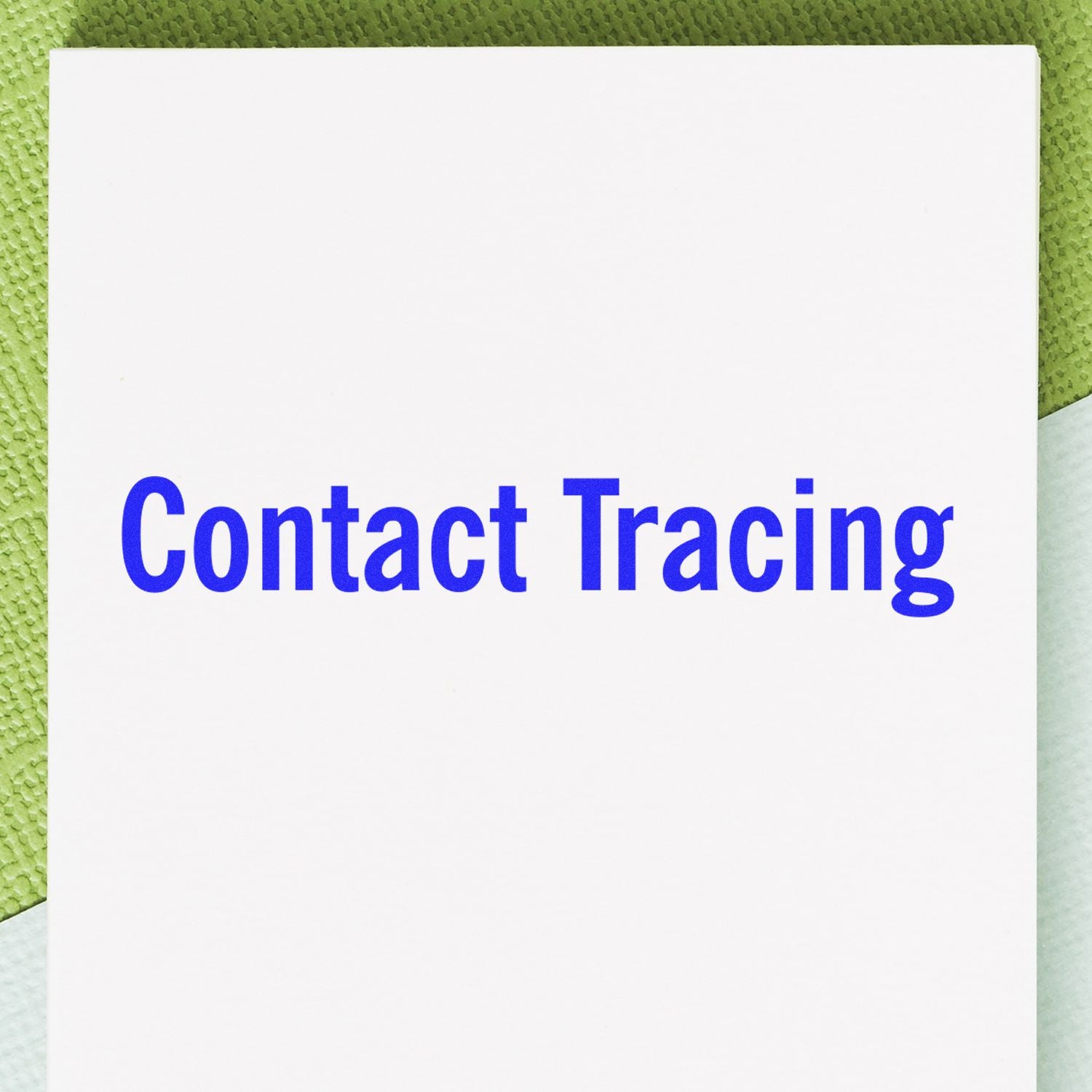 Contact tracing sign on white card, highlighting public health disease prevention and tracking for outbreaks