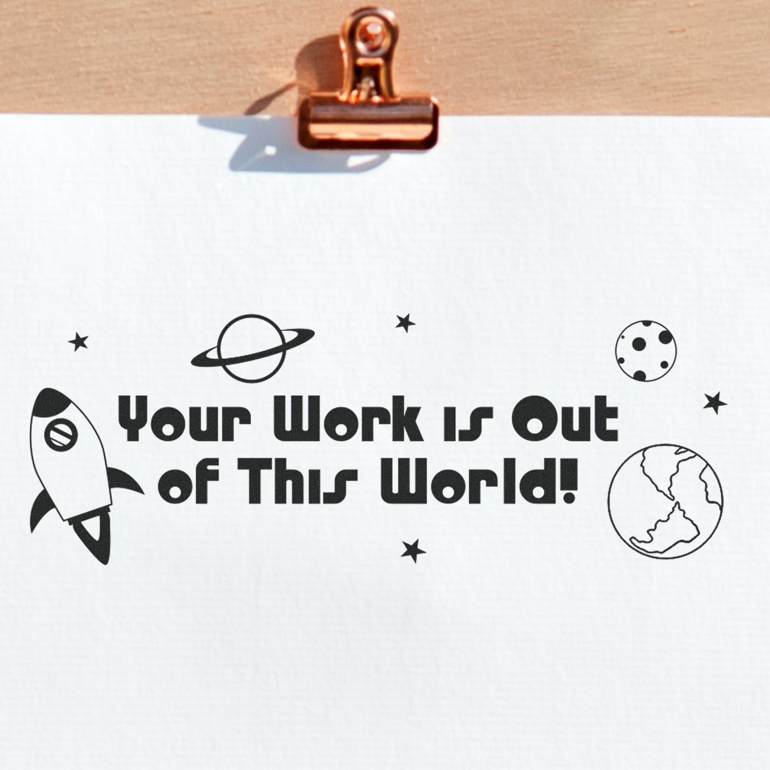 Space-themed motivation graphic reading Your work is out of this world! with rocket, planets, stars and UFO icons.