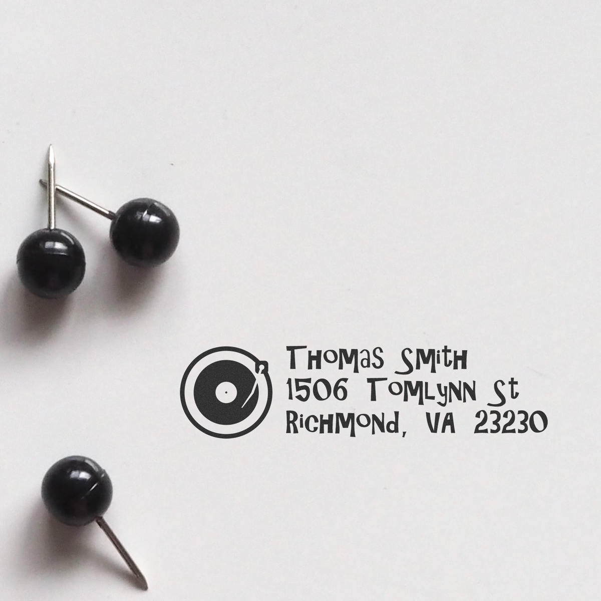 Custom return address rubber stamp impression with record logo for Thomas Smith, Richmond, VA 23230.