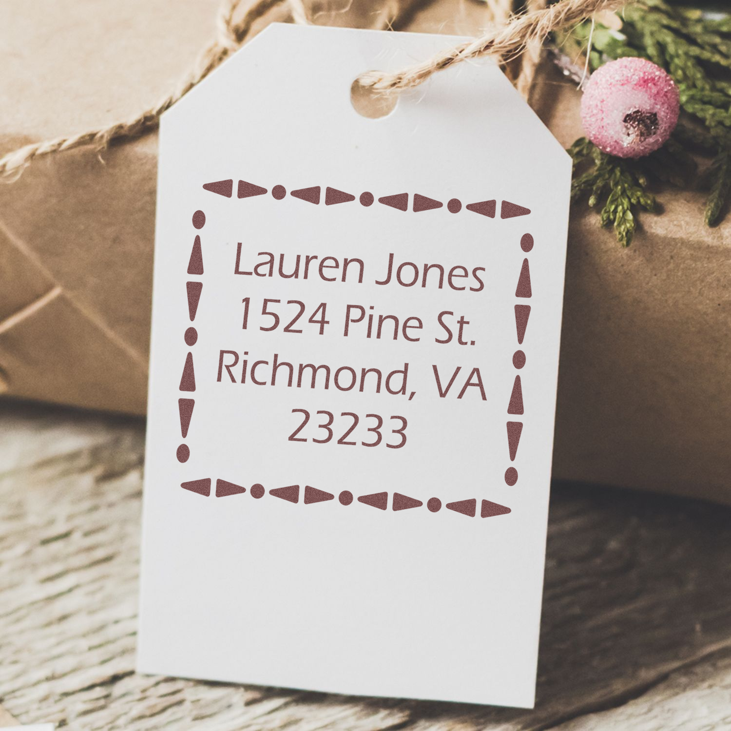 Personalized return address rubber stamp on gift tag with Lauren Jones, 1524 Pine St., Richmond, VA 23233.