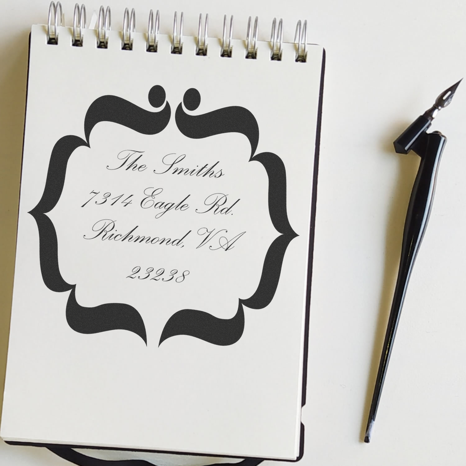 Custom return address rubber stamp design with elegant script for The Smiths, 7314 Eagle Rd., Richmond, VA 23238.