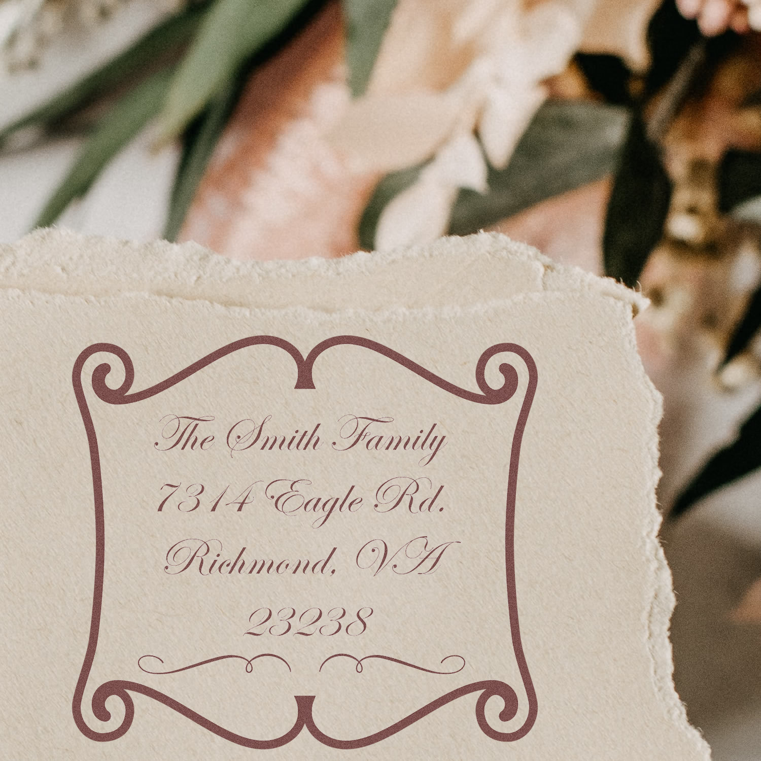 Custom family address rubber stamp for The Smith Family, 7314 Eagle Rd., Richmond, VA 23238, with decorative border.