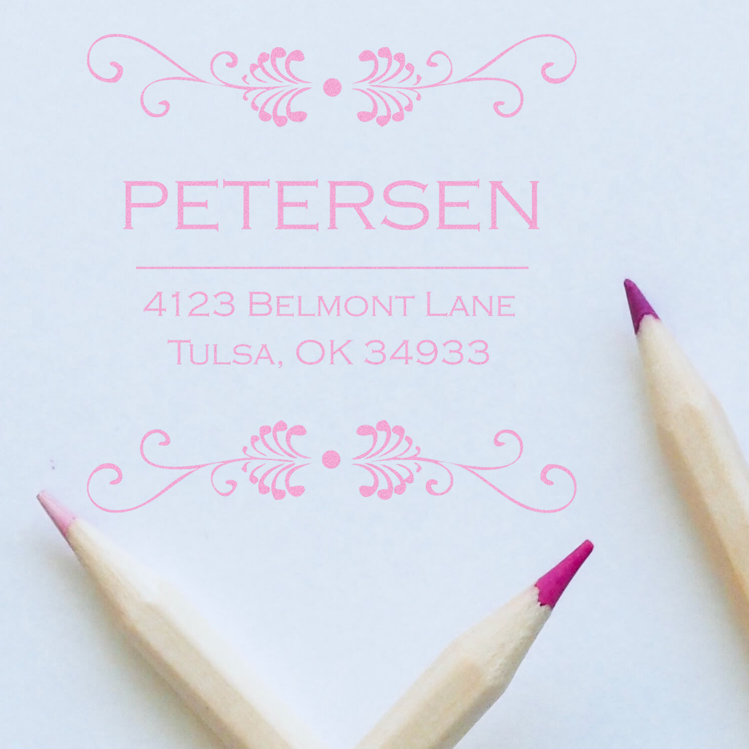 Custom return address rubber stamp with ornate pink flourishes for Petersen family mailings, Tulsa, OK.