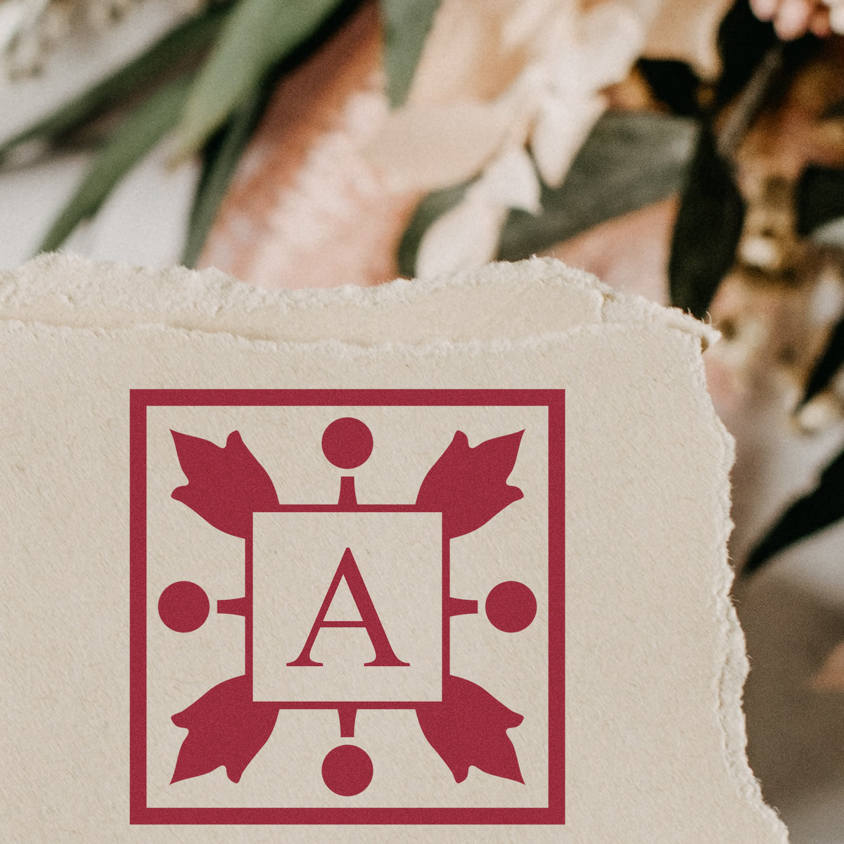 Custom monogram rubber stamp with letter A for branded stationery, invitations, and personalized paper goods