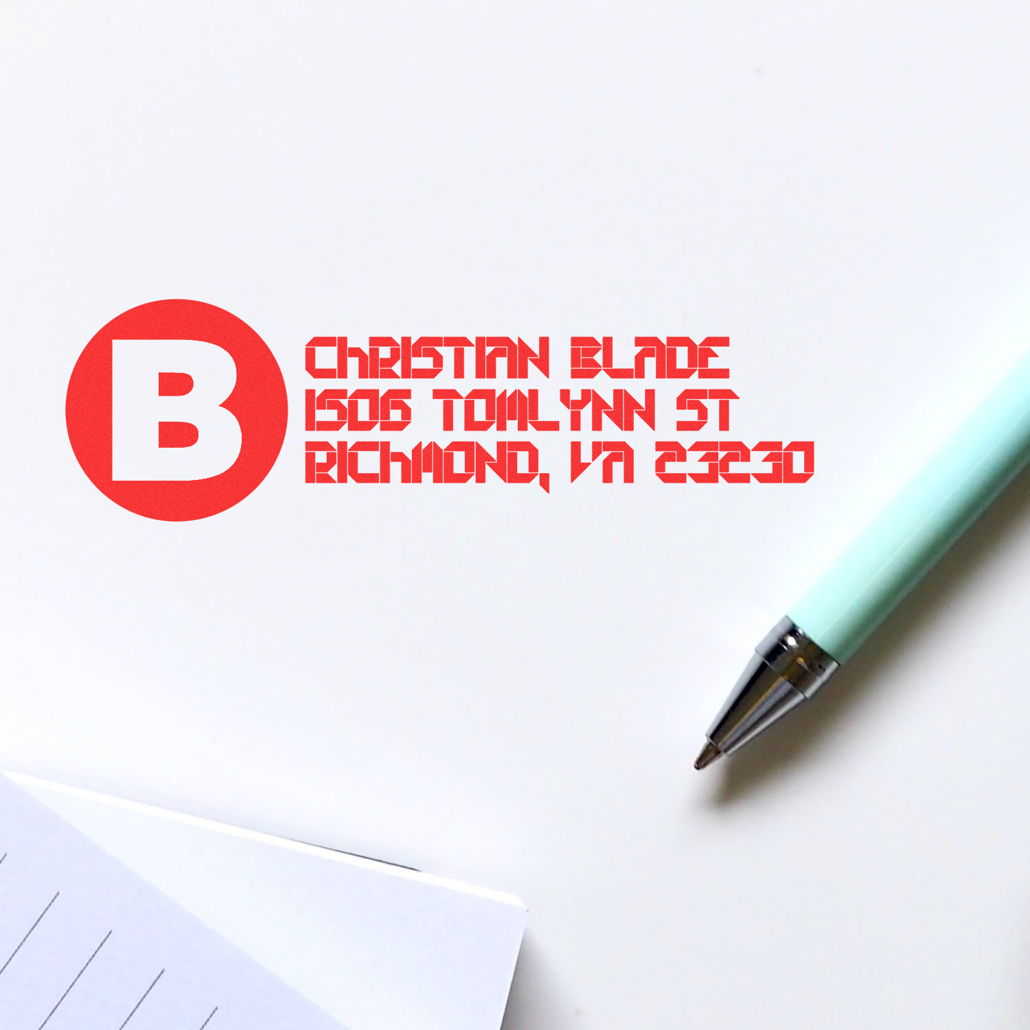 Custom rubber stamp design with Christian Blade logo and Richmond, VA address for business branding.