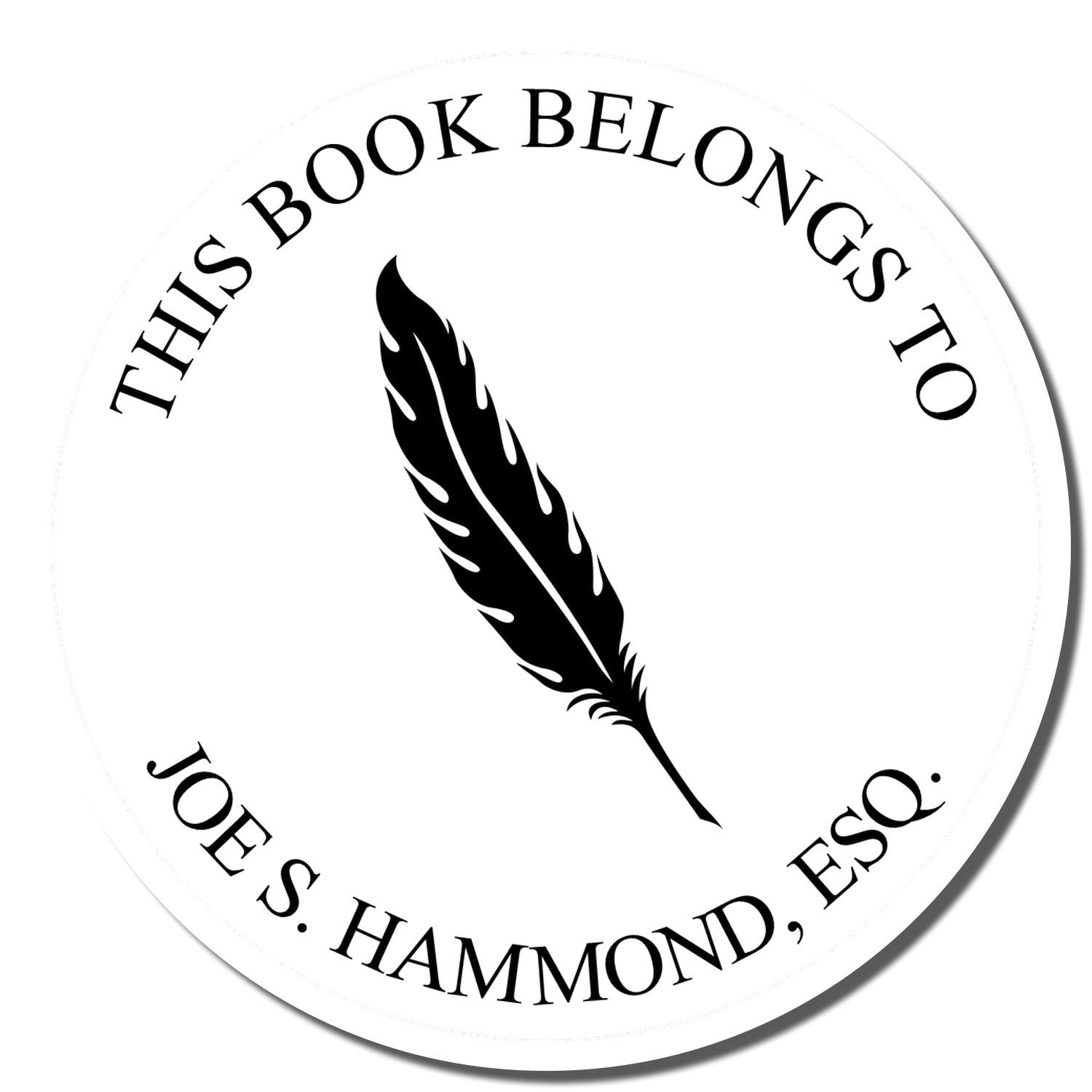 Custom book stamp reading This Book Belongs to Joe S. Hammond, Esq. with feather icon for personal library marking.