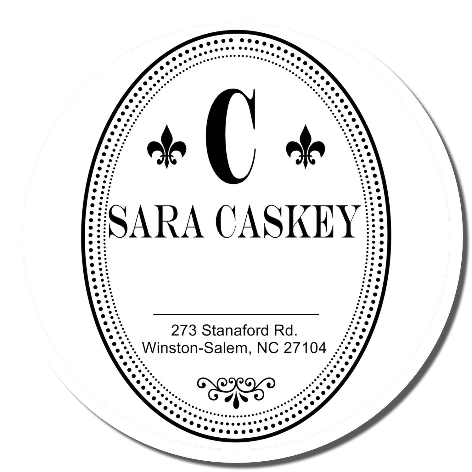 Personalized oval monogram rubber stamp with C, Sara Caskey name, and Winston-Salem, NC address.