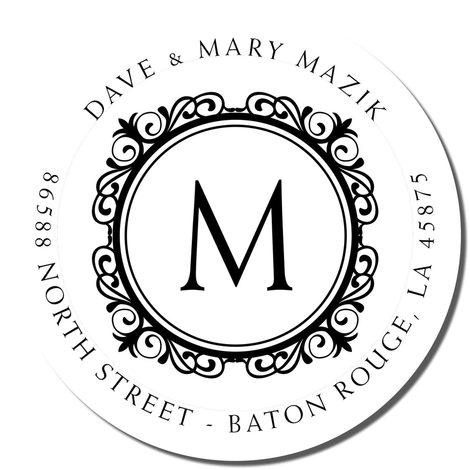 Personalized monogram rubber stamp with ornate circle frame, M initial, and Dave & Mary Mazik return address in Baton Rouge, LA.