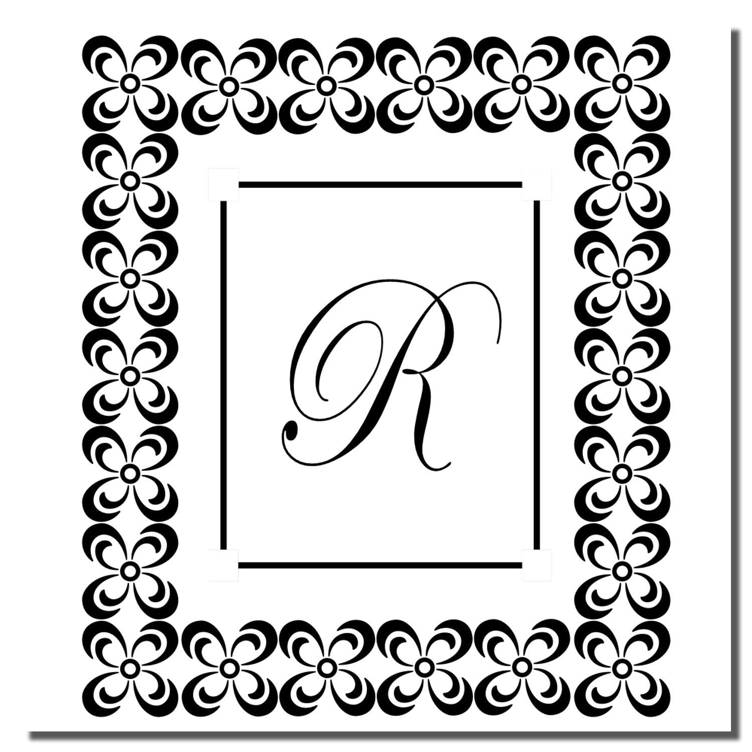 Custom floral monogram rubber stamp with letter R and decorative border for personalized wedding invitations and stationery.