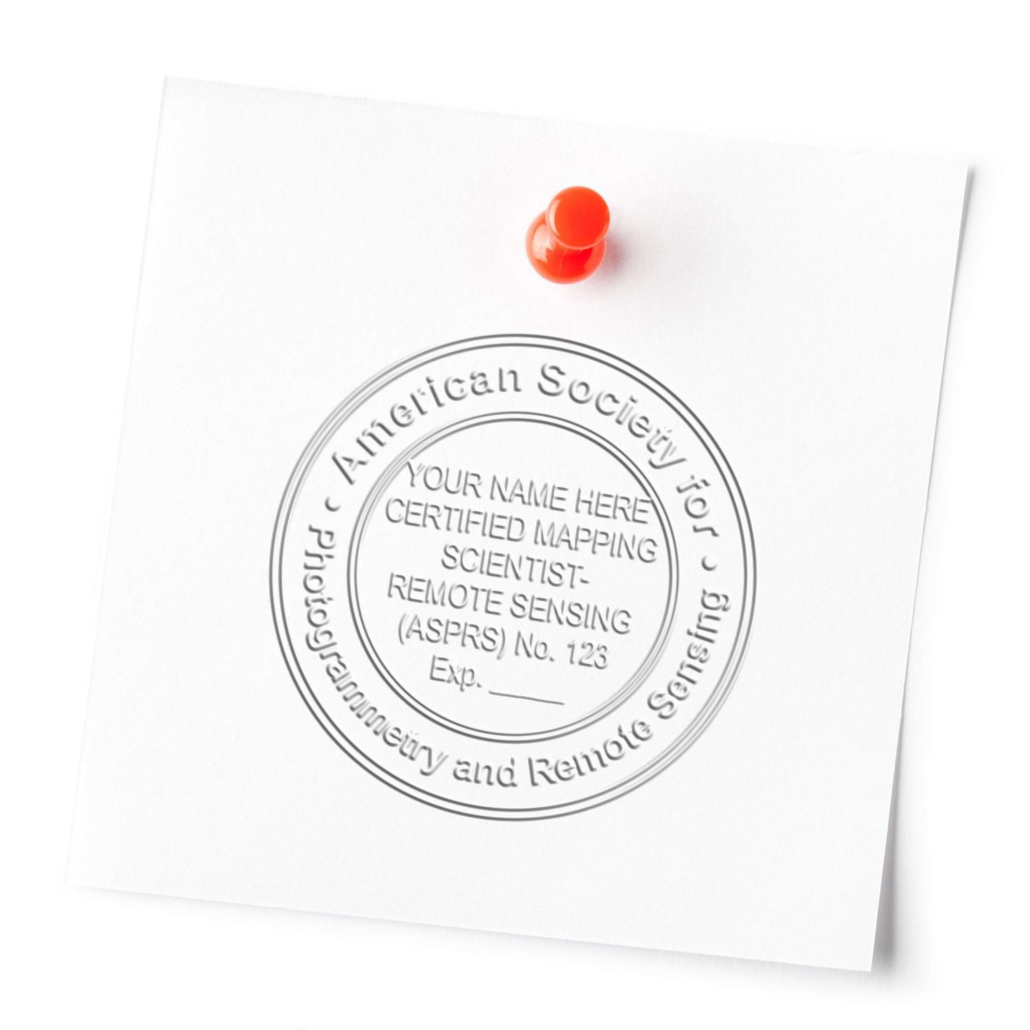 White pinned certificate with embossed American Society for Photogrammetry and Remote Sensing seal, certified mapping scientist remote sensing credential.
