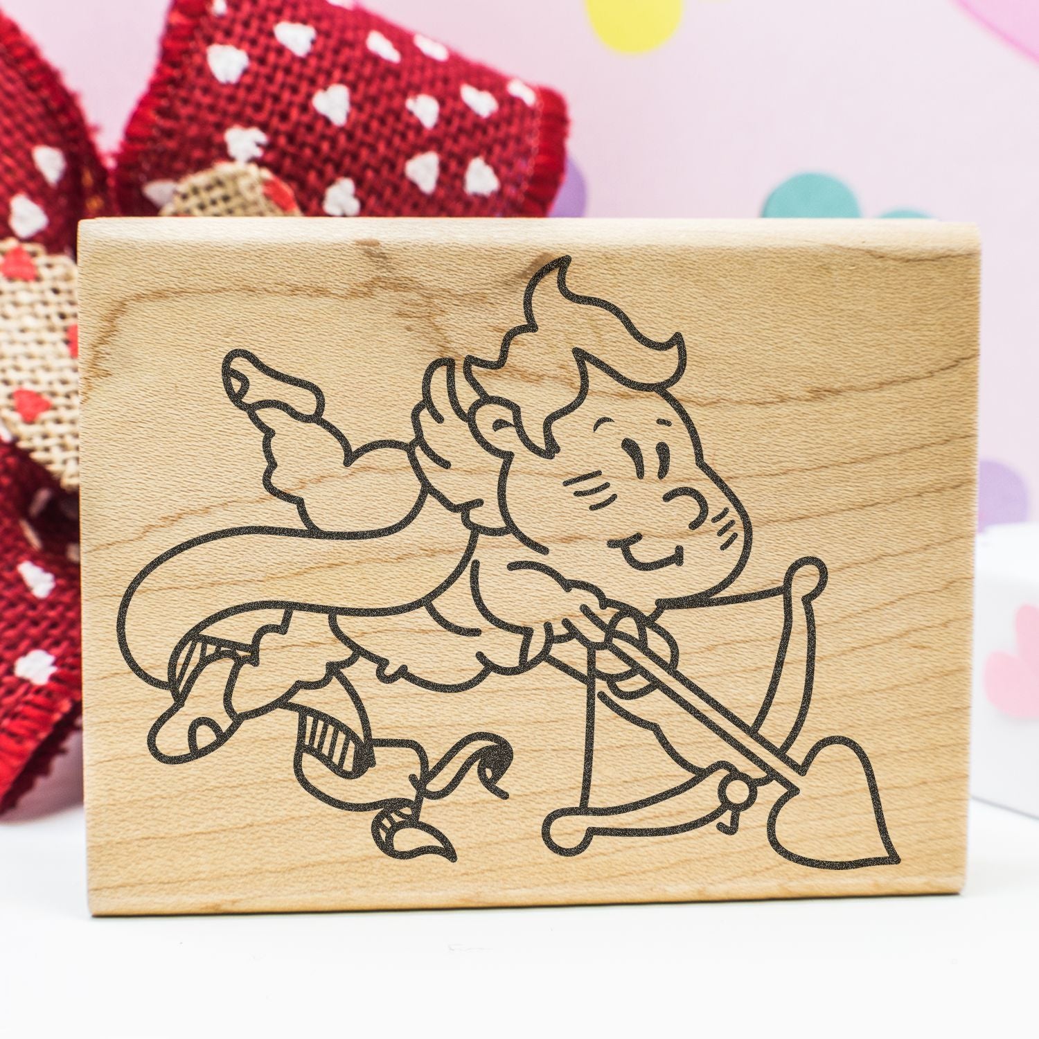 Wooden rubber stamp with cute cupid angel design, ideal for handmade crafts and Valentines Day projects