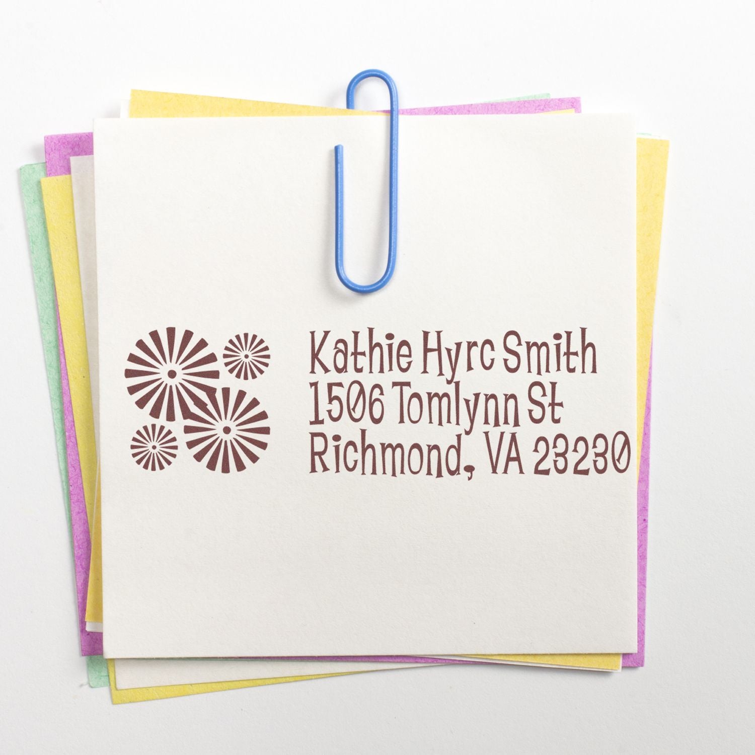 Custom rubber address stamp with floral design on stationery, perfect for wedding invitations and mailing labels.