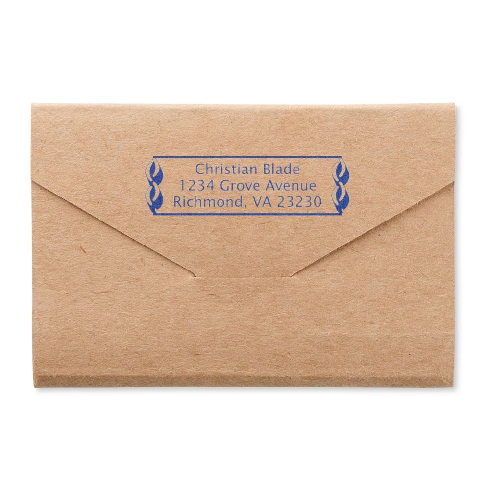 Custom return address rubber stamp on kraft envelope with blue ink for Christian Blade, Richmond, VA