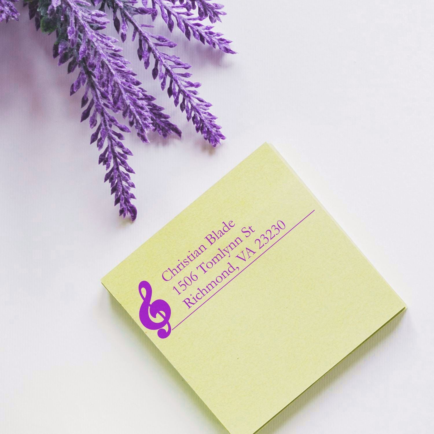 Custom return address rubber stamp with treble clef logo for music-themed envelopes and personalized stationery.