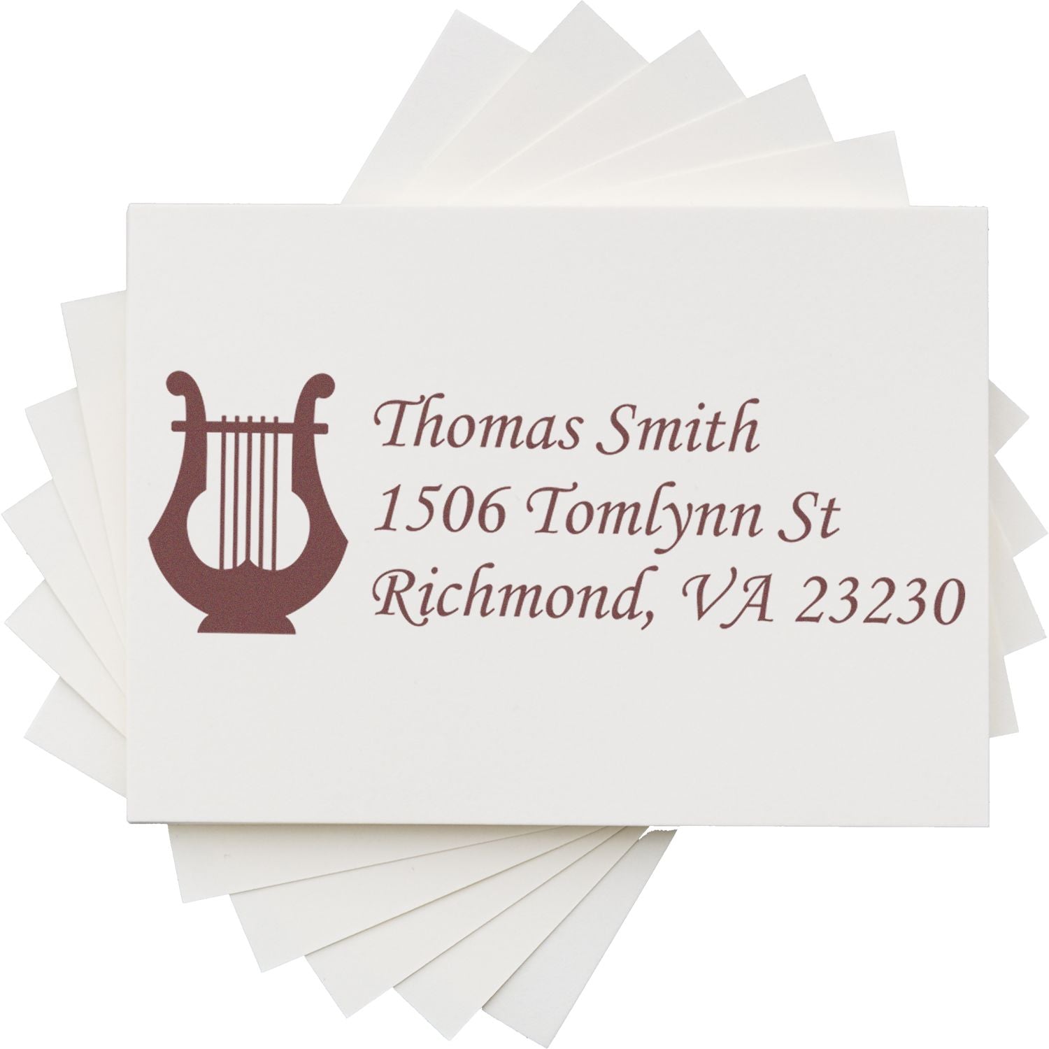 Custom return address rubber stamp with lyre icon for Thomas Smith, 1506 Tomlynn St, Richmond, VA 23230.
