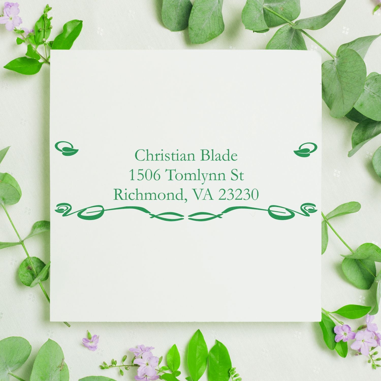 Custom return address rubber stamp with elegant green leaf design for personalized wedding or stationery mail.