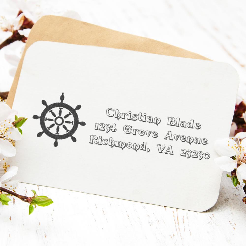 Custom nautical address rubber stamp with ship wheel design on envelope, featuring Christian Blades Richmond, VA return address.