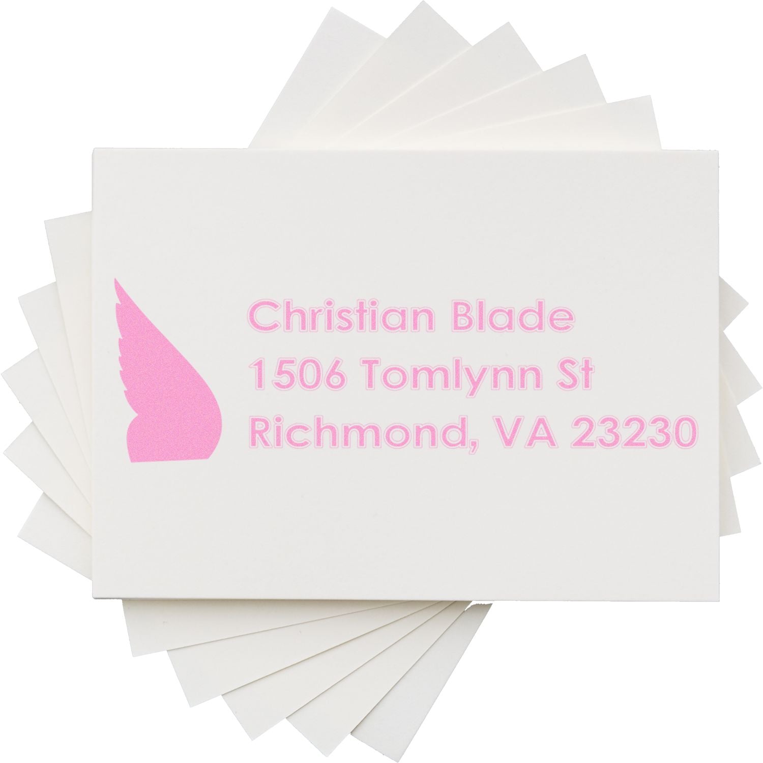 Custom pink address rubber stamp with Christian Blade return address, 1506 Tomlynn St, Richmond, VA 23230.