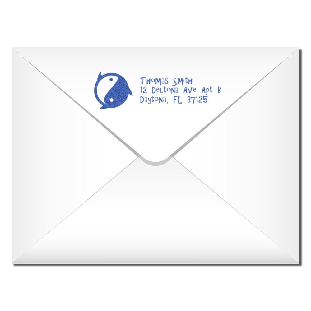 Custom return address rubber stamp imprint on envelope with name, address, and logo for personalized mailing.