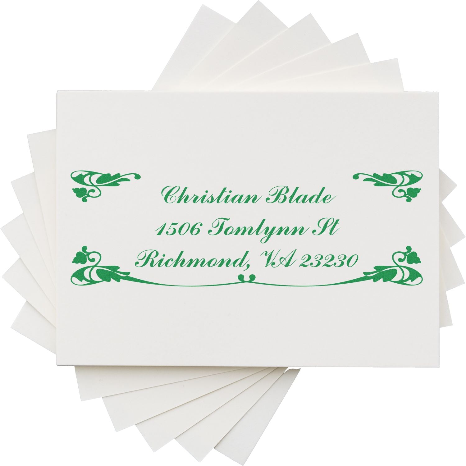 Custom return address rubber stamp with floral scroll design for envelopes, showing Christian Blade, Richmond, VA 23230.