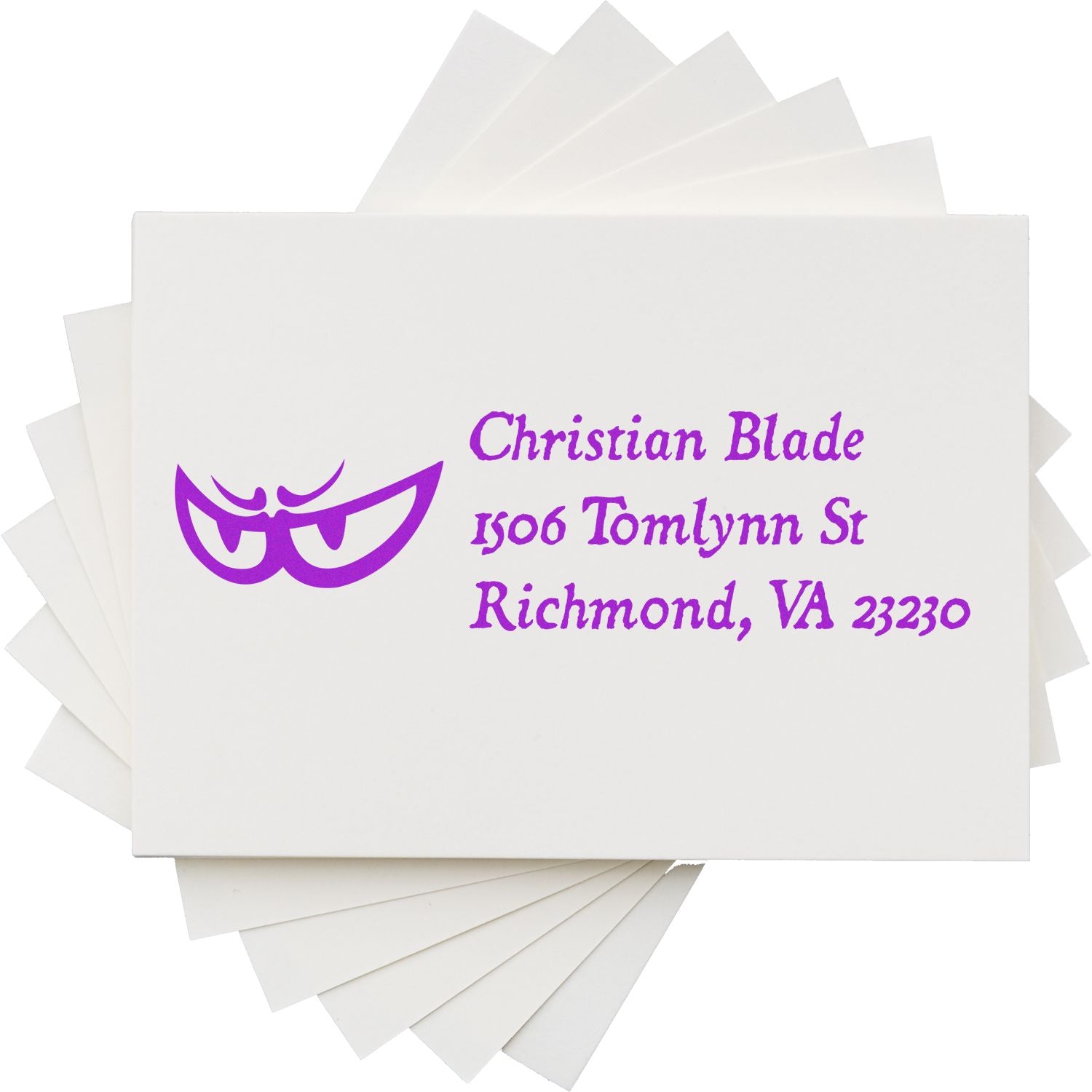 Custom address rubber stamp with purple Christian Blade return address for Richmond, VA on stacked cards.