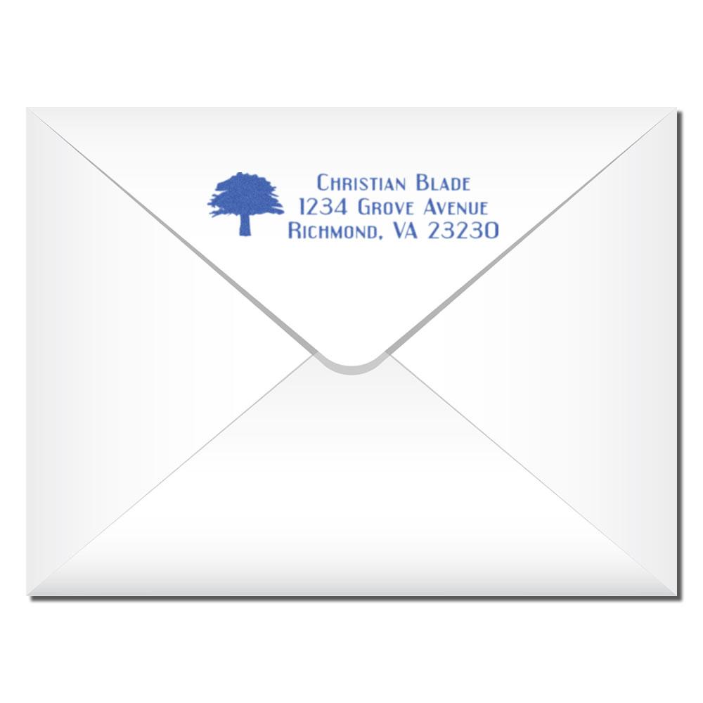 Custom return address rubber stamp on envelope with tree logo, Christian Blade, 1234 Grove Avenue, Richmond, VA 23230