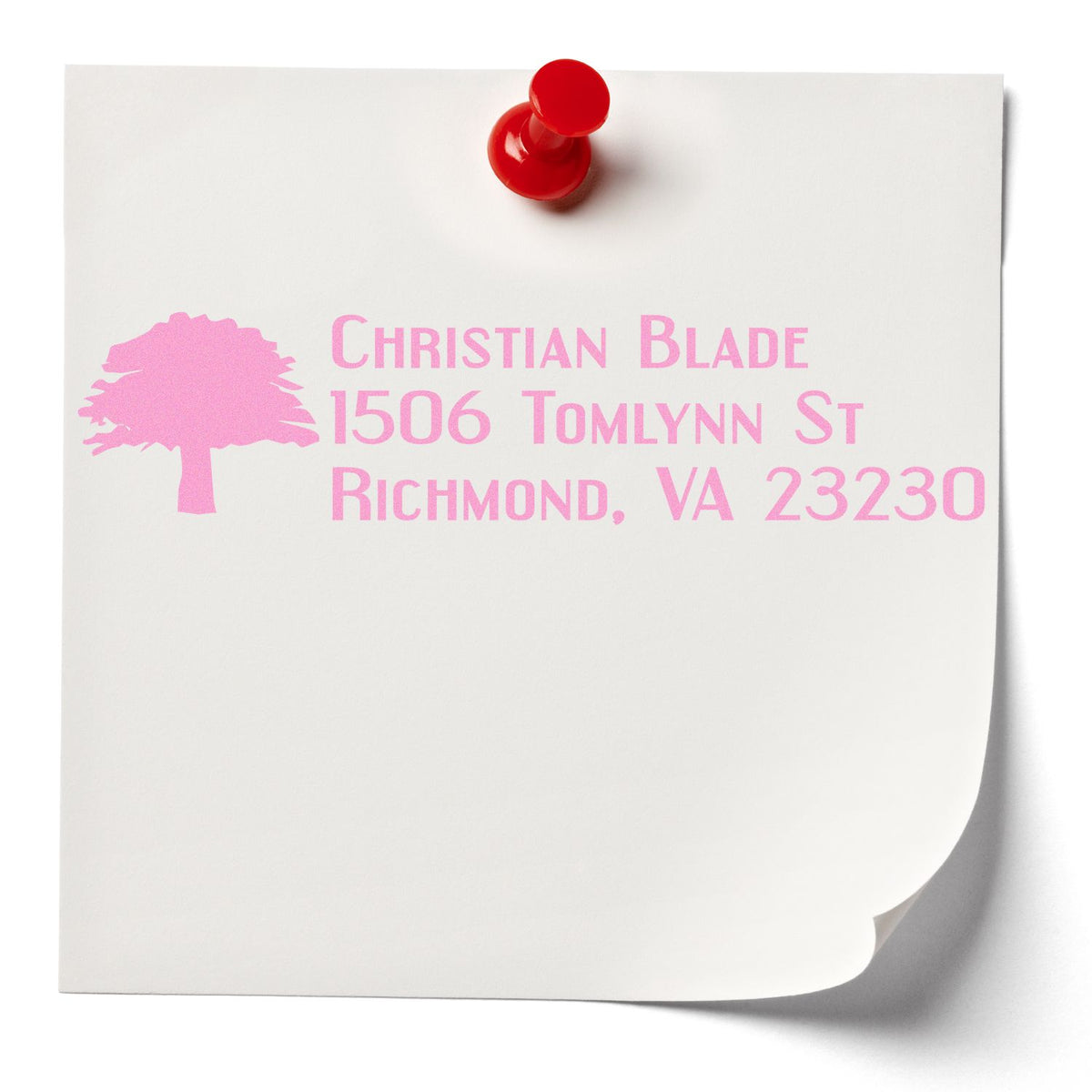 Custom rubber stamp return address sample with tree logo, showing Christian Blade, Richmond, VA 23230 in pink on white paper.