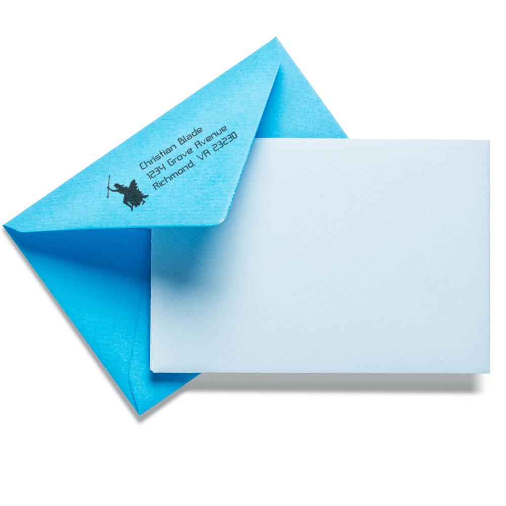 Custom return address rubber stamp on a blue envelope flap for personalized mail and business correspondence.