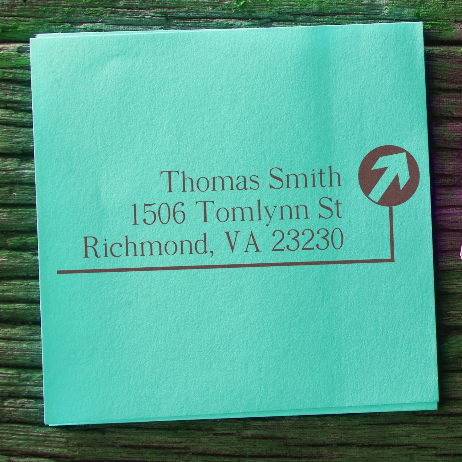 Personalized return address rubber stamp for Thomas Smith, Richmond VA 23230 on turquoise stationery.