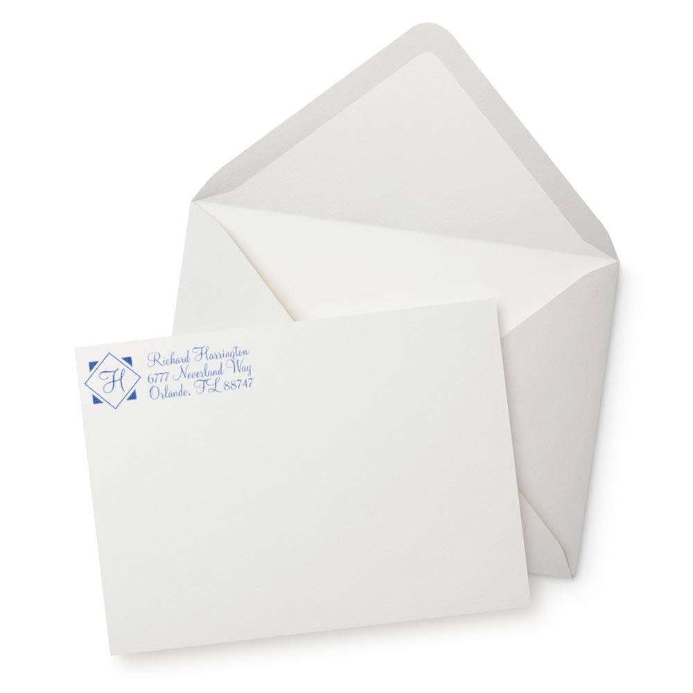 Custom return address rubber stamp on envelope and card for personalized mailing and wedding stationery