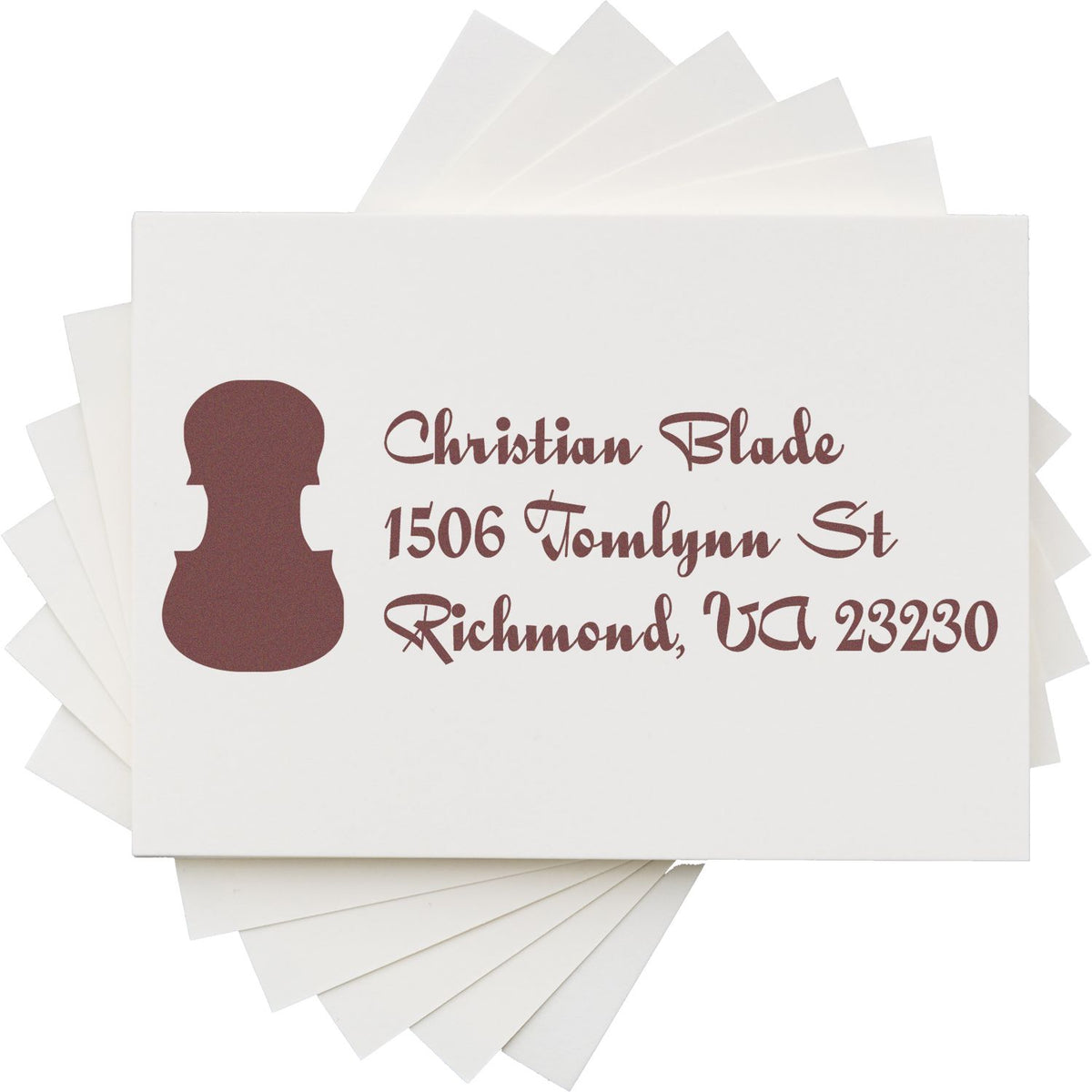 Custom return address rubber stamp with Christian Blade, 1506 Tomlynn St, Richmond, VA 23230 for envelopes.