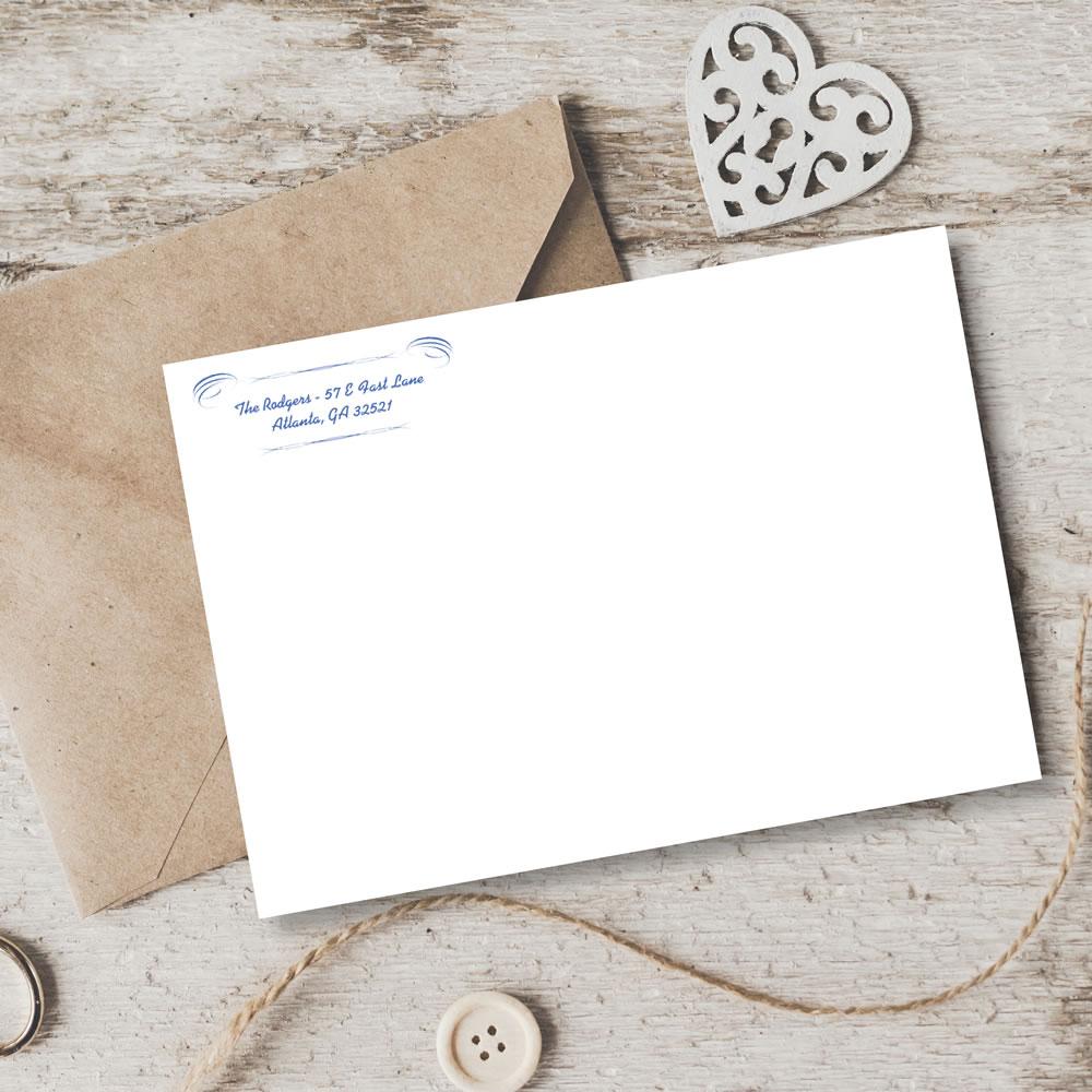 Return address rubber stamp on wedding stationery, shown on envelope and card for custom mailing and craft branding.