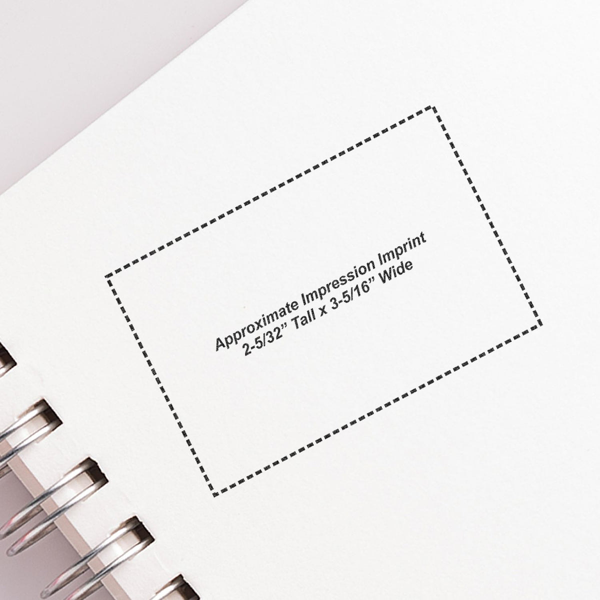 Spiral notebook page with dotted approximate imprint area for custom printable design template