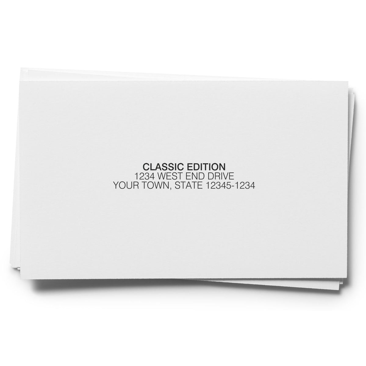 Classic edition stationery stack with centered address text, premium white greeting card design for direct mail branding use.