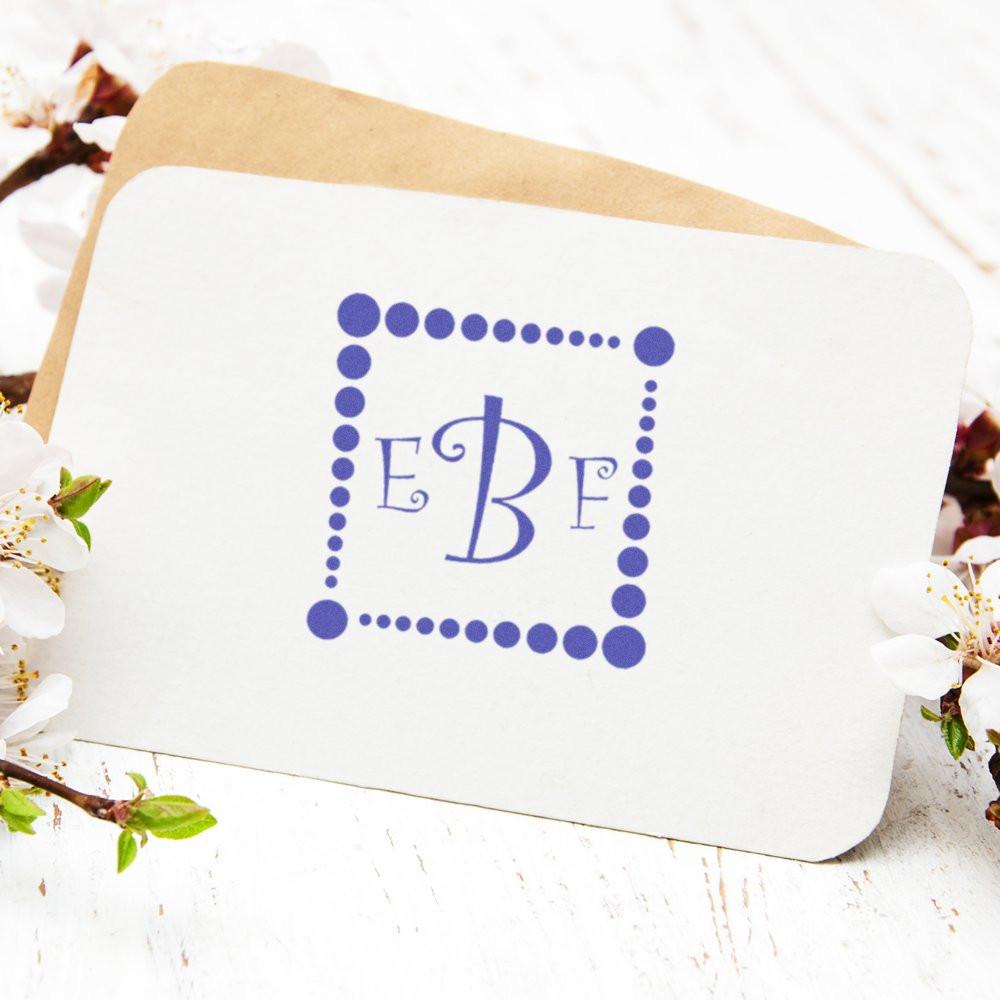 Custom monogram rubber stamp with dotted border, featuring EBF initials for personalized wedding or business stationery.