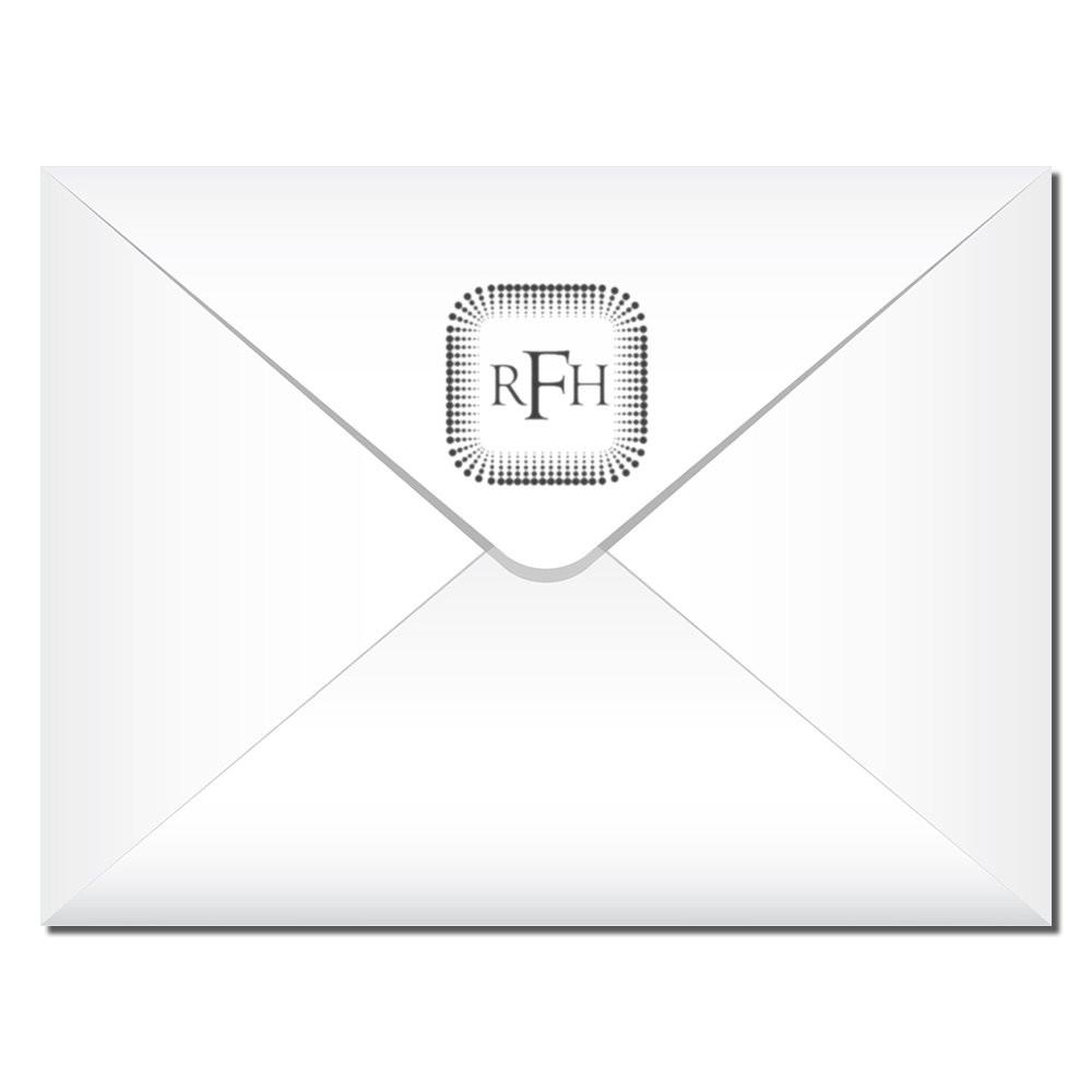 Custom monogram rubber stamp on a white envelope, perfect for personalized wedding invitations and business stationery.