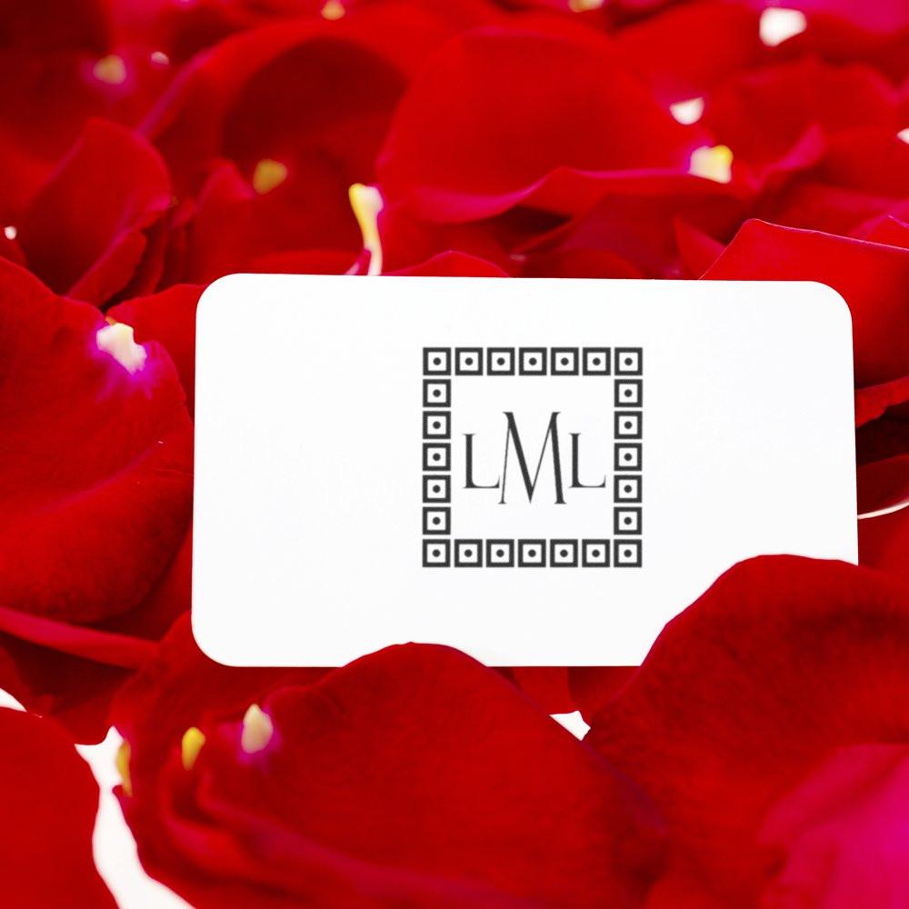 Custom monogram rubber stamp with LML logo, styled for elegant wedding stationery and romantic gifts.