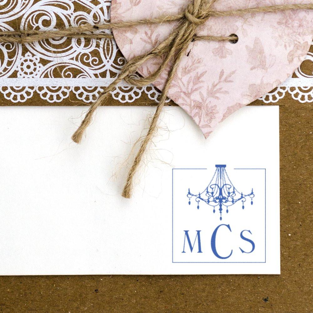 Handmade product packaging with twine and floral fabric wrap, featuring the MCS logo tag on a white gift card.