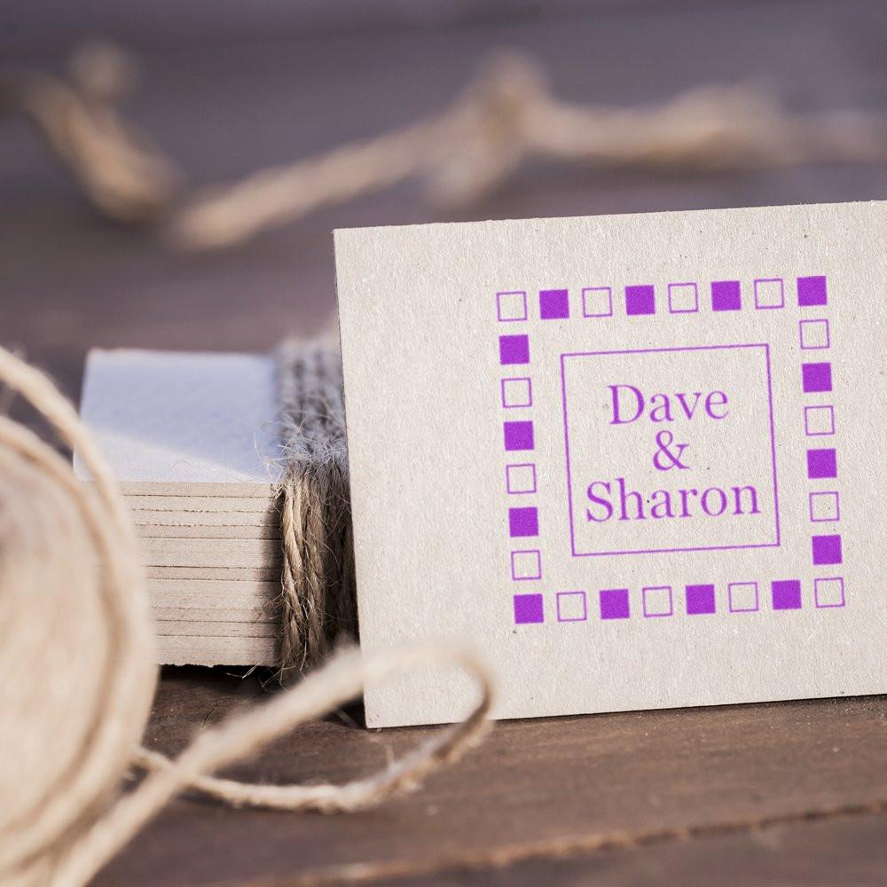 Custom rubber stamp with Dave & Sharon in purple, ideal for personalized wedding stationery and craft branding.