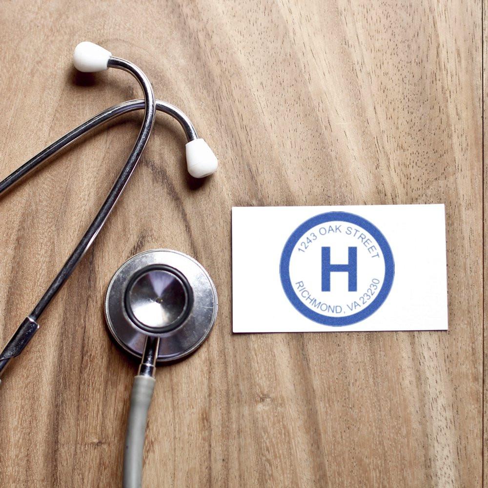 Stethoscope beside medical office contact card for 1245 Oak Street, Richmond VA 23220 healthcare services.