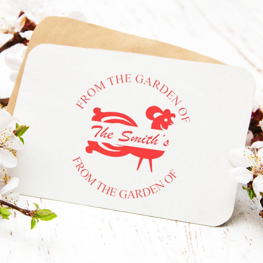 Custom rubber stamp for garden produce labels reading From the Garden of The Smiths with a personalized floral design.