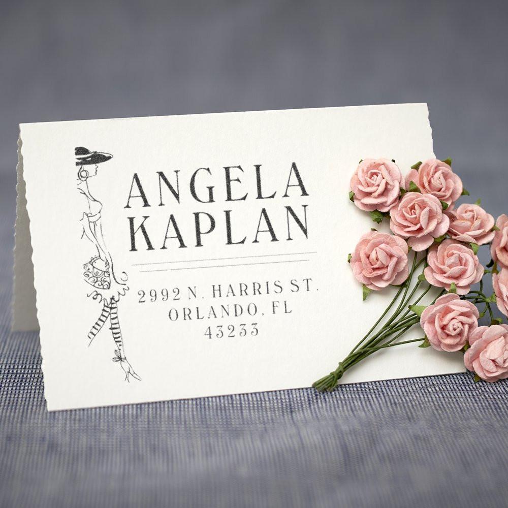 Personalized address card for Angela Kaplan with Orlando, FL mailing details and pink roses on a linen envelope