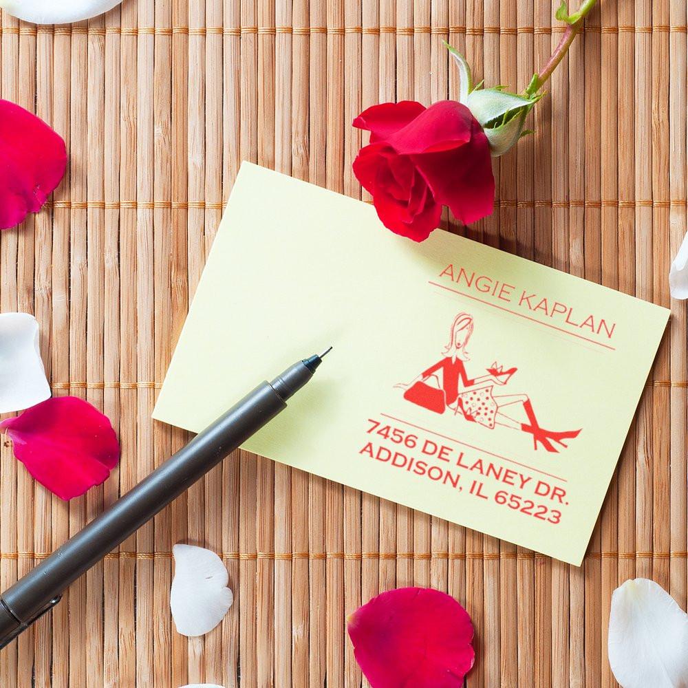 Personalized return address rubber stamp on envelope with rose petals, perfect for wedding invitations and stationery.
