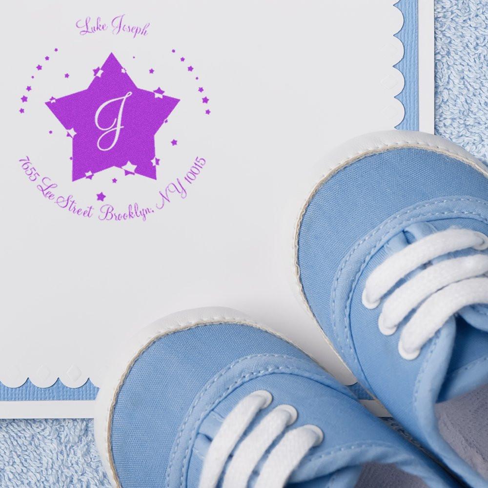Personalized baby shoe design with purple star monogram J and date text, close-up of blue lace-up sneakers for a gift.